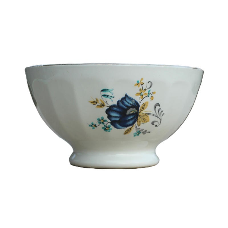 bol en faïence au décor de fleur bleue